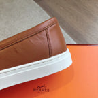 HERMES GAME SLIP-ON SNEAKER CARAMEL WITH TASSELS CALFSKIN