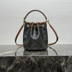 CELINE CLARA BAG 19 IN BLACK TRIOMPHE CANVAS AND BROWN CALFSKIN TRIM