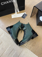 CHANEL ALPHABET MARTIN BOOTS IN FOREST GREEN LAMBSKIN