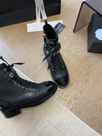 CHANEL ALPHABET MARTIN BOOTS IN BLACK LAMBSKIN