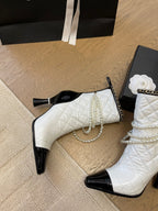 CHANEL HIGH HEELS 8CM BOOTS IN WHITE MIX BLACK CALFSKIN WITH PEARL CHAIN