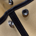 HERMES GARDEN PARTY 30CM IN DARK BEIGE TOILETS COTTON CANVAS AND BLACK CALFSKIN