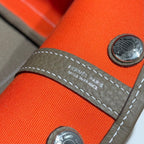HERMES GARDEN PARTY 30CM IN ORANGE MINIMUM TOILETS COTTON CANVAS AND BROWN CALFSKIN