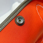HERMES GARDEN PARTY 30CM IN ORANGE MINIMUM TOILETS COTTON CANVAS AND BROWN CALFSKIN