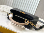 LOUIS VUITTON CAPUCINES BB 27 IN BLACK MIX WHITE TAURILLON GOLD HARDWARE