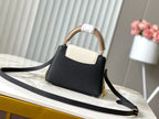 LOUIS VUITTON CAPUCINES MINI 21 IN BLACK MIX WHITE TAURILLON GOLD HARDWARE