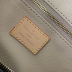 LOUIS VUITTON DOPP KIT 28 IN BROWN MONOGRAM CANVAS