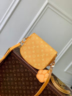LOUIS VUITTON MONTSOURIS MESSENGER PM 20 IN PEPPER ORANGE MONOGRAM HERITAGE CANVAS