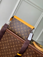 LOUIS VUITTON GASTON WEARABLE WALLET 18 IN BROWN MONOGRAM CANVAS MIX YELLOW CALFSKIN