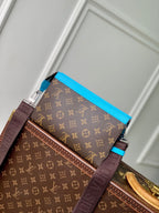LOUIS VUITTON GASTON WEARABLE WALLET 18 IN BROWN MONOGRAM CANVAS MIX SKY CALFSKIN