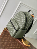 LOUIS VUITTON DISCOVERY PM BACKPACK 38 IN OLIVE GREEN MONOGRAM LAMBSKIN