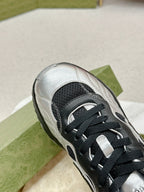 GUCCI RIPPLE TRAINER LIGHT SILVER AND BLACK LAMBSKIN
