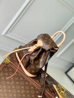 LOUIS VUITTON MONTSOURIS MINI BACKPACK 25 IN BROWN MONOGRAM CANVAS