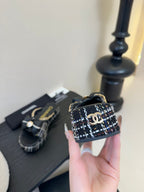 CHANEL PLATFORM FLIP-FLOPS IN BLACK TWEED FABRIC