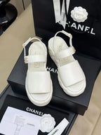 CHANEL HIGH WEDGE SANDALS IN WHITE LAMBSKIN