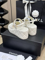 CHANEL HIGH WEDGE SANDALS IN WHITE LAMBSKIN