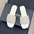 CHANEL WOVEN SLIPPERS WHITE COWHIDE SOLE