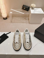 CHANEL SNEAKERS IN GLOSSY GOLDEN LAMBSKIN