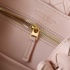 BOTTEGA VENETA SMALL ANDIAMO 25 IN LIGHT PINK LAMBSKIN