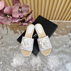 CHANEL PLATFORM SLIPPERS WITH FLOWER IN WHITE LAMBSKIN