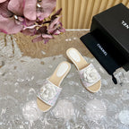 CHANEL PLATFORM SLIPPERS WITH FLOWER IN WHITE LAMBSKIN