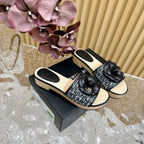 CHANEL PLATFORM SLIPPERS WITH FLOWER IN BLACK LAMBSKIN