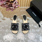 CHANEL PLATFORM SLIPPERS WITH FLOWER IN BLACK LAMBSKIN