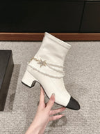 CHANEL LOW CUT BOOTS IN WHITE STRETCH LAMBSKIN AND GROSGRAIN WITH PEARL CHAIN