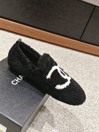 CHANEL LOAFERS IN BLACK FLEECE WITH WHITE LOGO