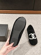 CHANEL LOAFERS IN BLACK FLEECE WITH WHITE LOGO