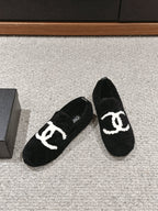 CHANEL LOAFERS IN BLACK FLEECE WITH WHITE LOGO