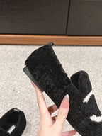 CHANEL LOAFERS IN BLACK FLEECE WITH WHITE LOGO