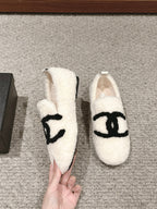 CHANEL LOAFERS IN WHITE FLEECE WITH BLACK LOGO
