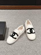 CHANEL LOAFERS IN WHITE FLEECE WITH BLACK LOGO