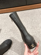 CHANEL SHORT BOOTS IN BLACK LAMBSKIN AND FABRIC