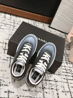 CHANEL SNEAKER IN BLACK MIX COOL GRAY HAND-POLISHED CALFSKIN 977825