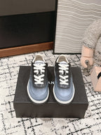 CHANEL SNEAKER IN BLACK MIX COOL GRAY HAND-POLISHED CALFSKIN 977825