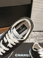 CHANEL SNEAKER IN BLACK MIX COOL GRAY HAND-POLISHED CALFSKIN 977825