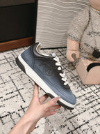 CHANEL SNEAKER IN BLACK MIX COOL GRAY HAND-POLISHED CALFSKIN 977825