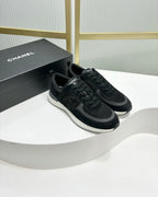 CHANEL SNEAKER IN BLACK SUEDE AND BREATHABLE MESH
