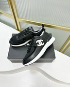 CHANEL SNEAKER IN BLACK SUEDE WITH WHITE LOGO