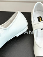 CHANEL FLAT SHOES IN BLACK AND WHITE LAMBSKIN GOLD HARDWARE