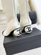 CHANEL PEARL BOOTS IN WHITE CALFSKIN