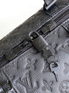 LOUIS VUITTON LV 25S KEEPALL BANDOULIÈRE BAG 50 IN BLACK EMBOSSED TAURILLON CALFSKIN MONOGRAM