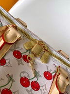 LOUIS VUITTON KEEPALL BANDOULIÈRE 45 IN WHITE AND RED CALFSKIN