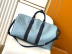 LOUIS VUITTON LV 25S KEEPALL BANDOULIÈRE BAG 50 IN BLUE MONOGRAM HERITAGE CALFSKIN