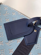LOUIS VUITTON LV 25S KEEPALL BANDOULIÈRE BAG 50 IN BLUE MONOGRAM HERITAGE CALFSKIN