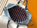 LOUIS VUITTON LV 25S KEEPALL BANDOULIÈRE BAG 50 IN BLUE MONOGRAM HERITAGE CALFSKIN