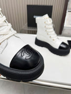 CHANEL SHORT BOOTS IN WHITE MIX BLACK COWHIDE
