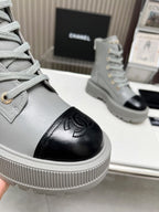 CHANEL SHORT BOOTS IN SLATE GREY MIX BLACK COWHIDE